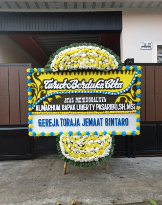 Papan Bunga Duka di Lito