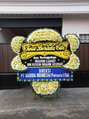 Papan Bunga Duka di Lito